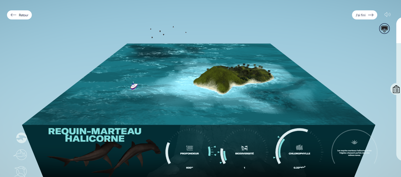 La carte et le panneau d'information de l'expérience VR Détectives des profondeurs. La carte montre l'océan entourant l'île de Cocos. Le panneau affiche des indices sur la position de l'animal. - click to enlarge La carte et le panneau d'information de l'expérience VR Détectives des profondeurs. La carte montre l'océan entourant l'île de Cocos. Le panneau affiche des indices sur la position de l'animal.