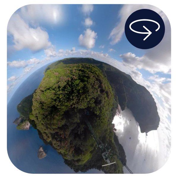 Fisheye aerial view of Cocos Island. The 360° video icon used on the Ocean School website is in the top right corner of the image. This icon shows an arrow making a 360° turn. - click to enlarge Fisheye aerial view of Cocos Island. The 360° video icon used on the Ocean School website is in the top right corner of the image. This icon shows an arrow making a 360° turn.