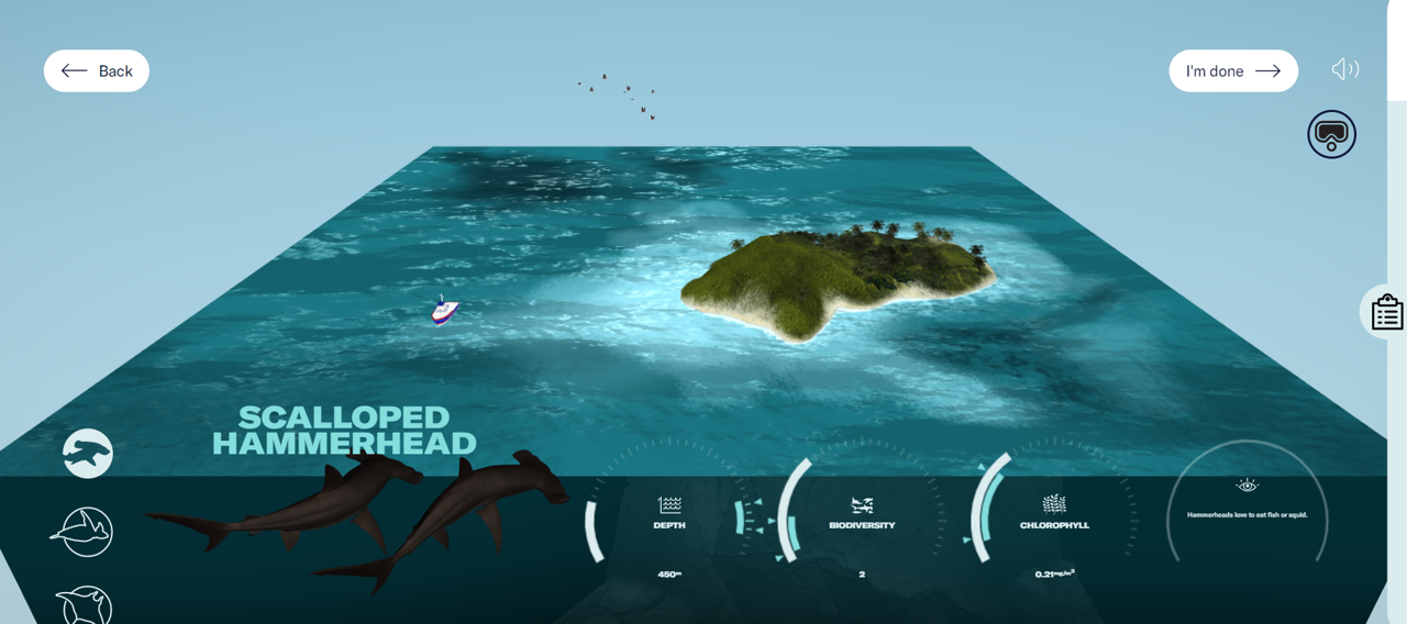 The Dive Detective VR experience’s map and information panel. The map shows the ocean surrounding Cocos island. The information panel displays clues about the animal’s location. - click to enlarge The Dive Detective VR experience’s map and information panel. The map shows the ocean surrounding Cocos island. The information panel displays clues about the animal’s location.